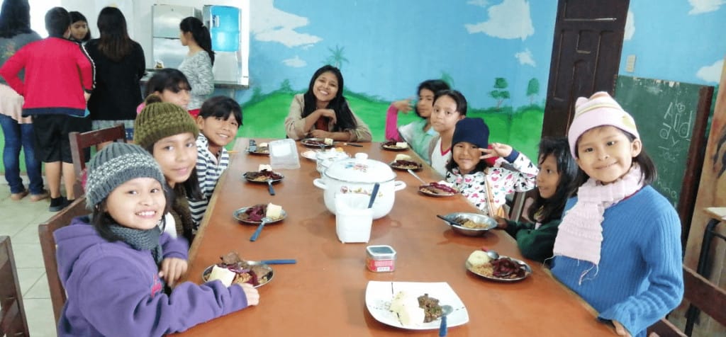 Kind enjoy a nutritious meal at Haven of Hope Bolivia COVID-19 update